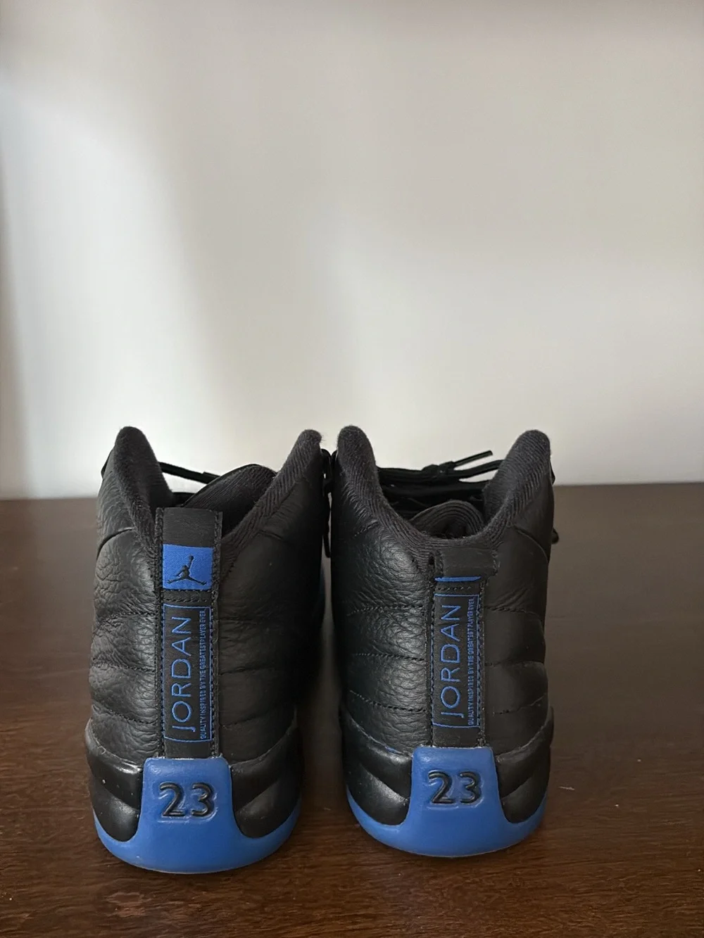 Nike Black High-Top Sneakers with Blue Accents